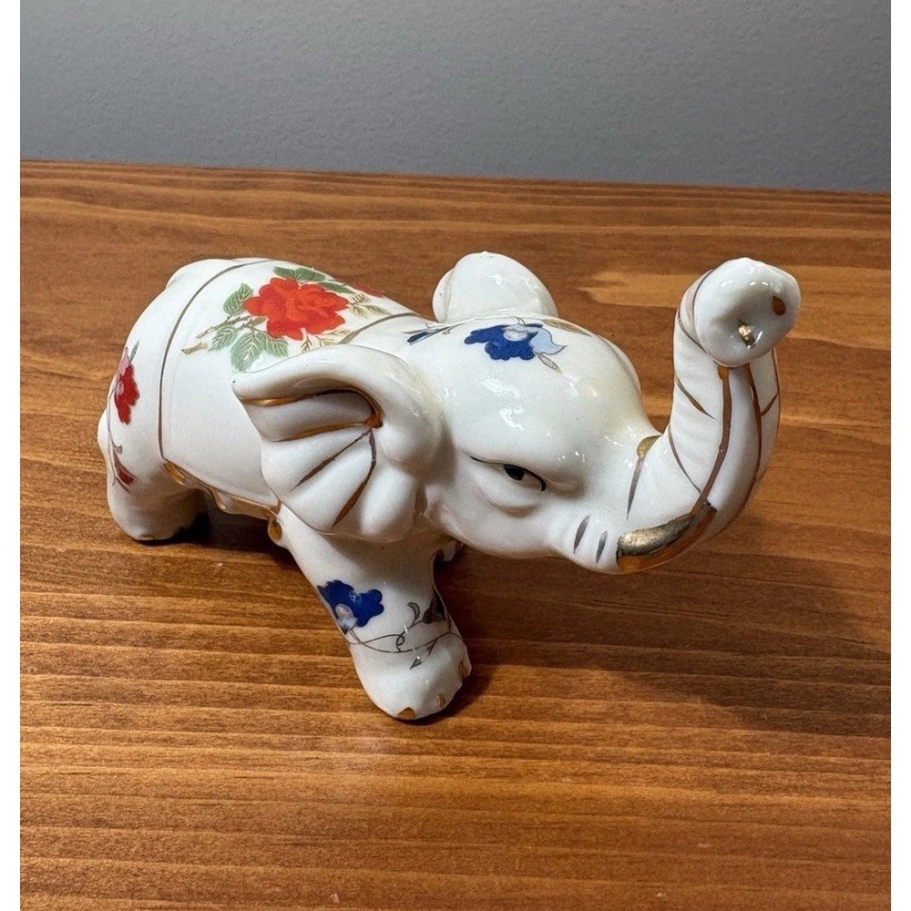 Vintage Elephant Figurine Hand Painted Gold Trim And Floral Design 4”. Porcelain